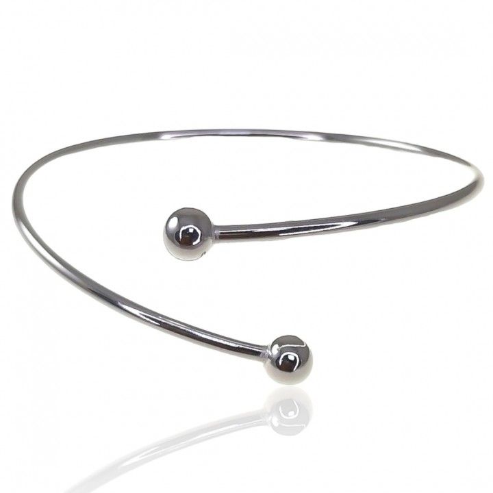 Pulsera rígida cruzada bolas